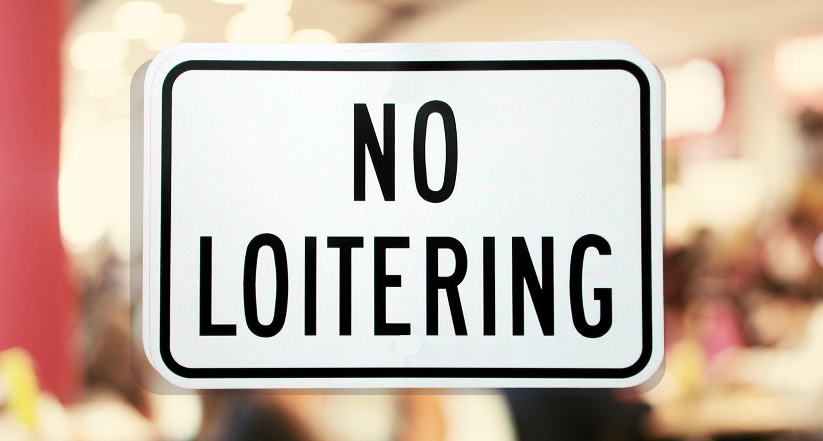 anti-loitering sign in front of a restaurant
